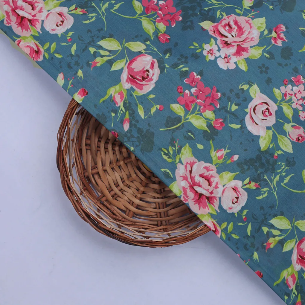 Blue Muslin Fabric with Pink Roses - Image 2